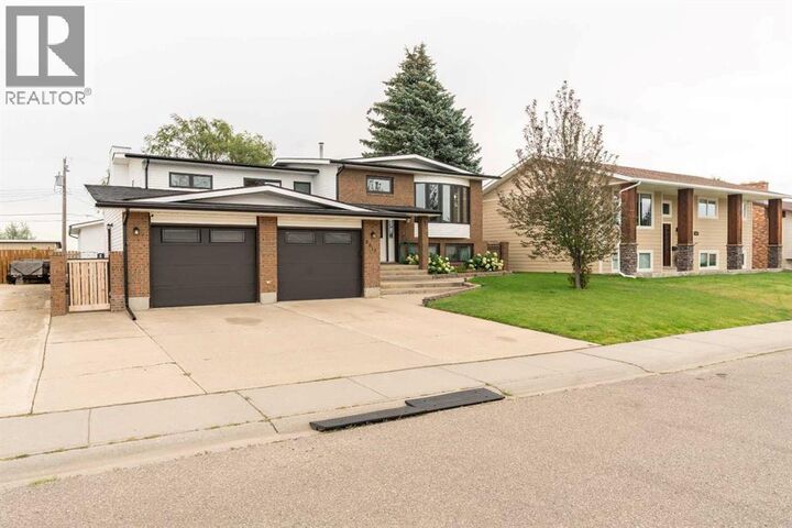 Property Photo: 6017 57 Street AB T1G 1K1