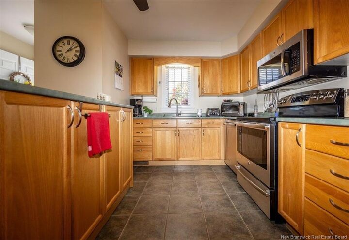 Property Photo: 508 Riverside Drive 8 NB E3A 8C2
