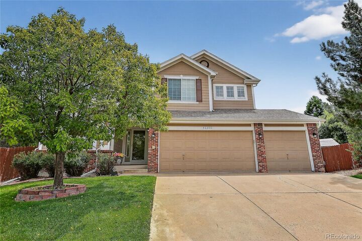 Property Photo: 12450 S Downy Creek Court CO 80134