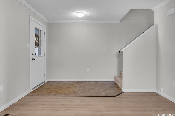 Property Photo: 207 McCallum Way 12 SK S7L 0A1