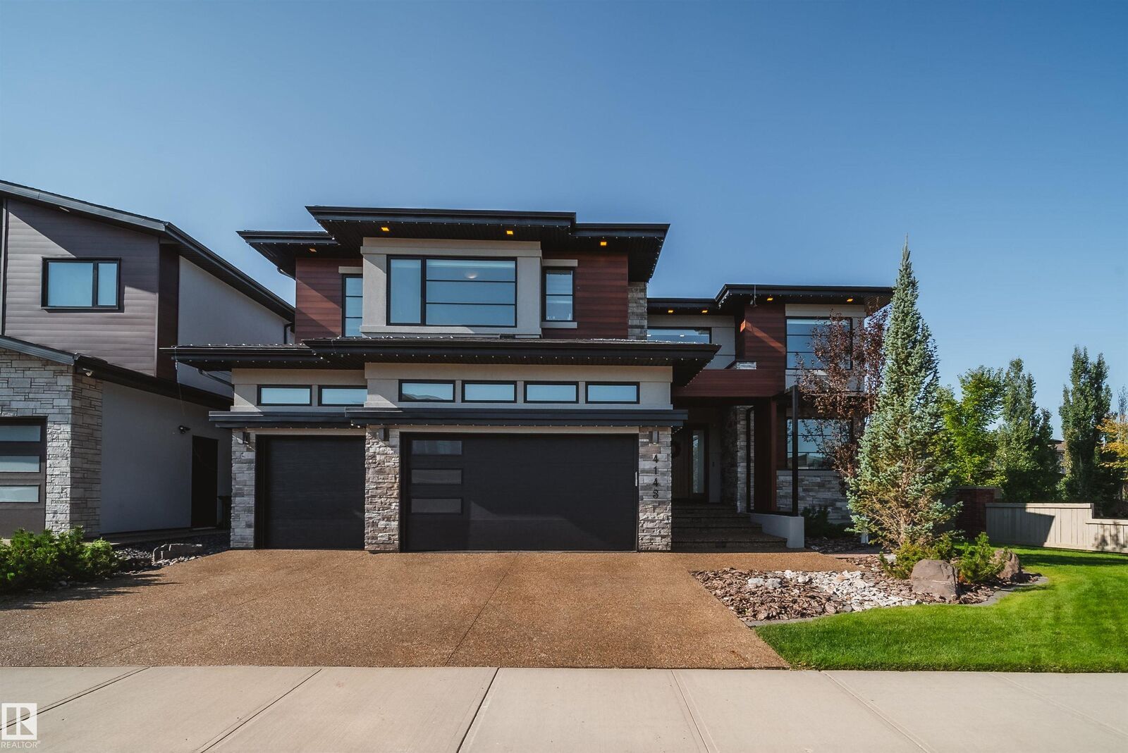 Property Photo: 4143 Kennedy Green Green SW AB T6W 3B3
