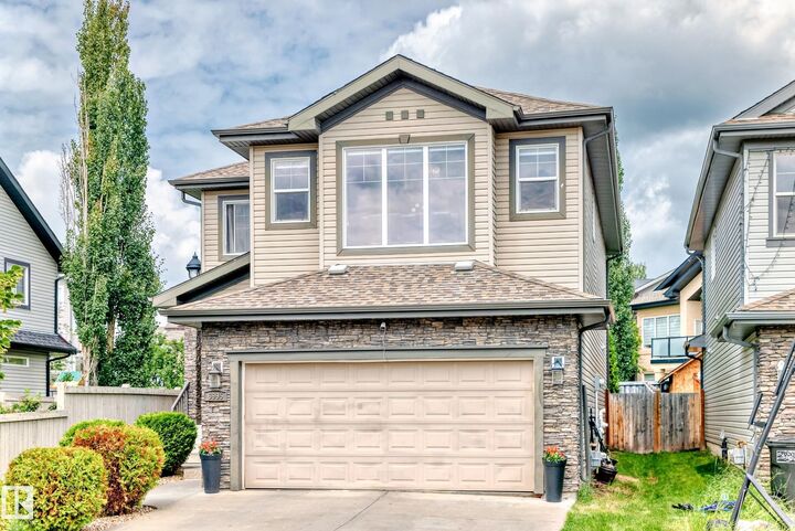 Property Photo: 6995 Strom Lane NW AB T6R 0P1