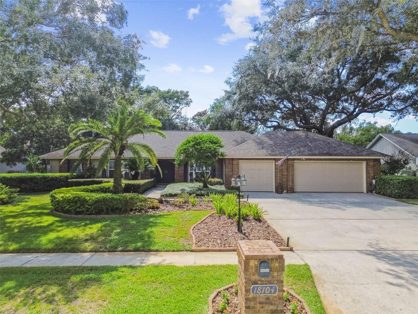 Property Photo: 18104 Woodcreek Place FL 33548