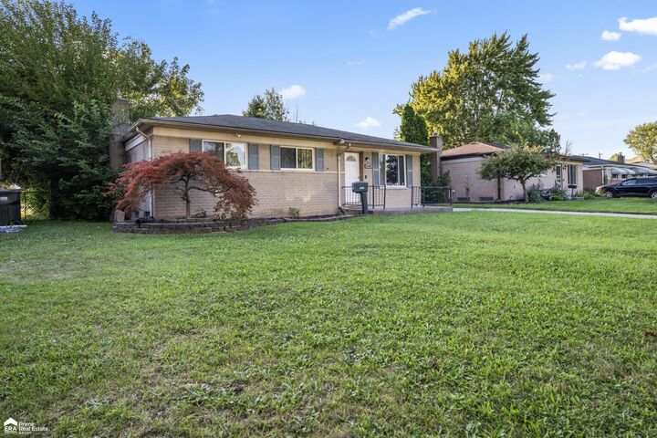 Property Photo: 37301 Barrington Dr Drive MI 48312