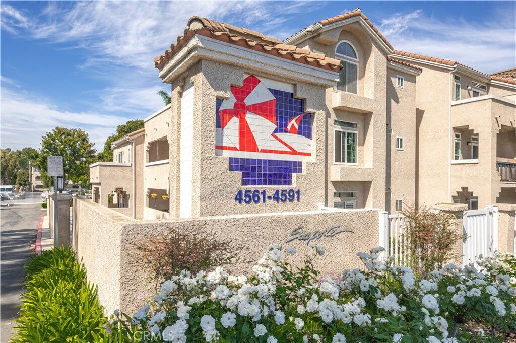 Property Photo: 4591 Warner Avenue 101 CA 92649