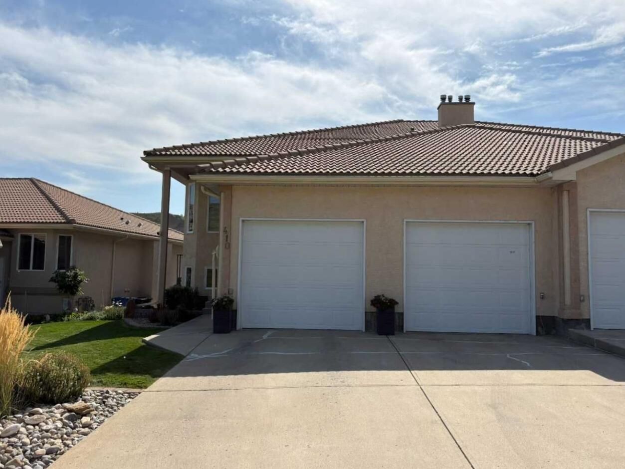 Property Photo: 410 Canyon Boulevard W B AB T1K 6V2