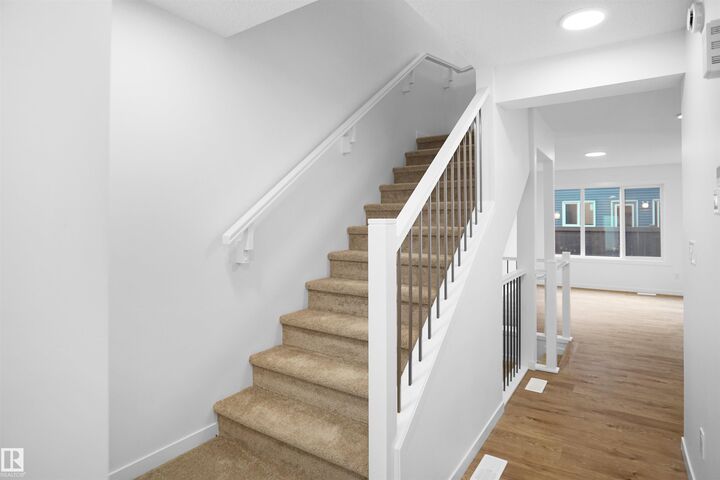Property Photo: 1430 Aster Way NW 29 AB T6T 2N8