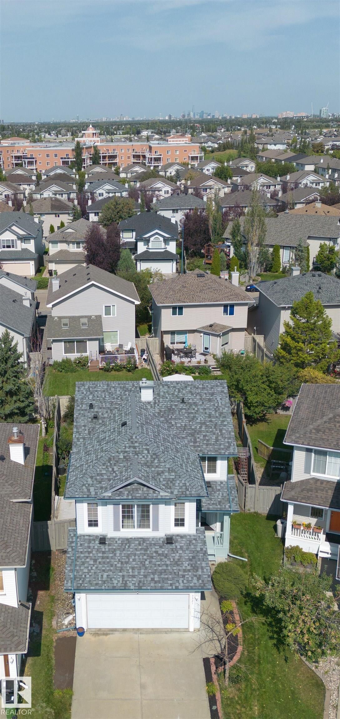 Property Photo: 3327 McPhadden Close SW AB T6W 1L2
