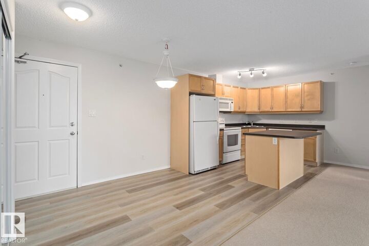 Property Photo: 16311 95 Street NW 446 AB T5Z 3Y5