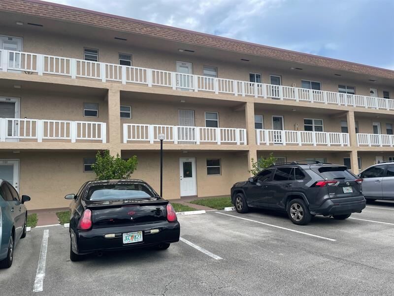 Property Photo: 608 SW Natura Blvd 109 FL 33441