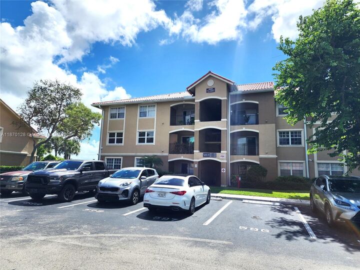 Property Photo:  11600 SW 2nd St 18101  FL 33025 
