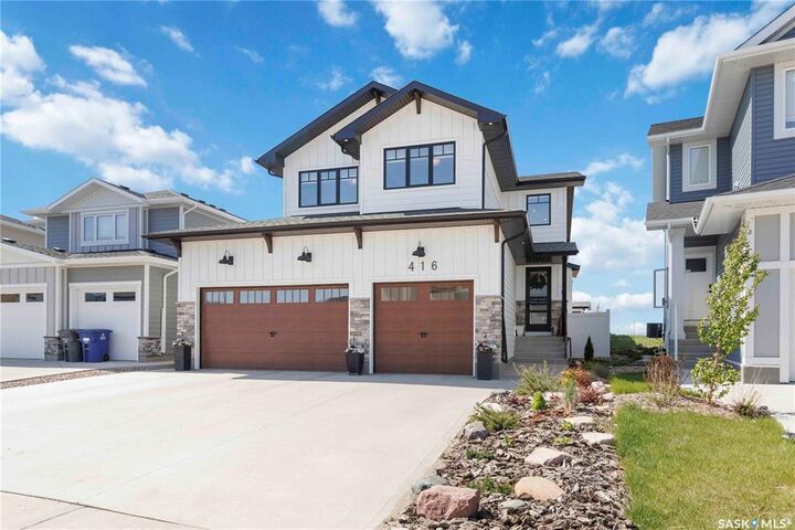 Property Photo:  416 Woolf Bend  SK S7W 1E5 