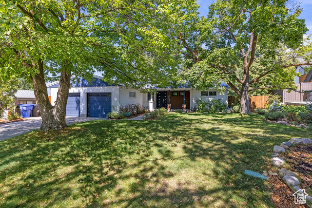 Property Photo: 3635 E Apollo Dr S UT 84124