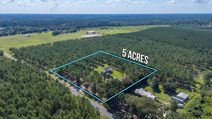 Property Photo:  3714 Earl Campbell Road  FL 32567 