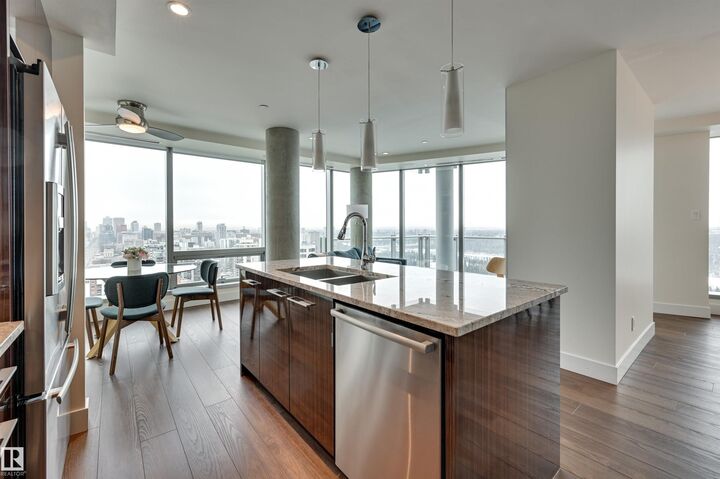 Property Photo: 11969 Jasper Avenue NW 2102 AB T5K 0P1