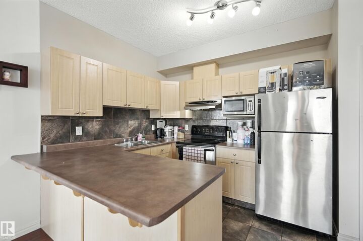 Property Photo: 10118 95 Street NW 301 AB T5J 1R3