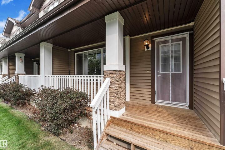 Property Photo: 8209 217 Street NW 35 AB T5T 6Z4