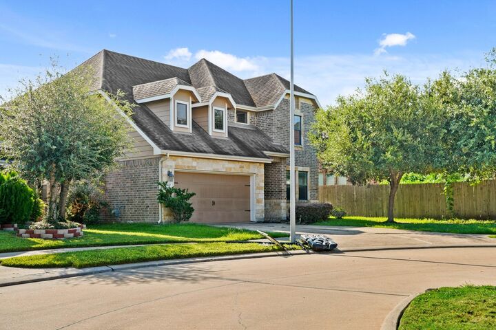 Property Photo: 5402 Drumlin Field Way TX 77407