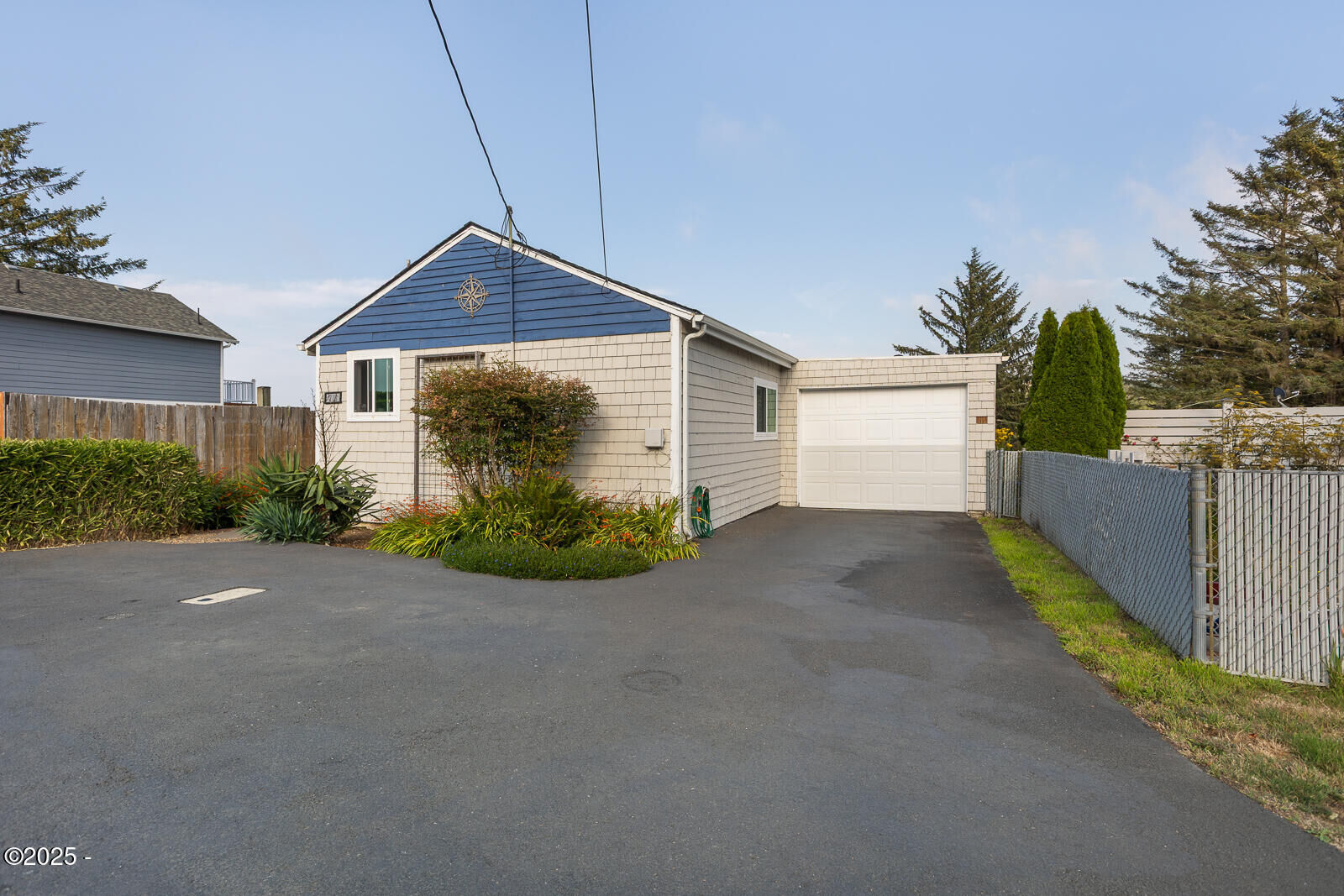 Property Photo:  210 SE Surf Ave  OR 97367 