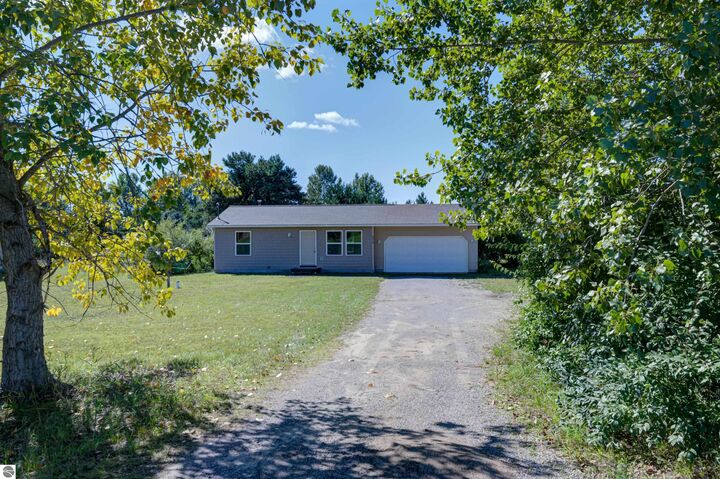 Property Photo:  5975 Barney Road  MI 49684-9608 