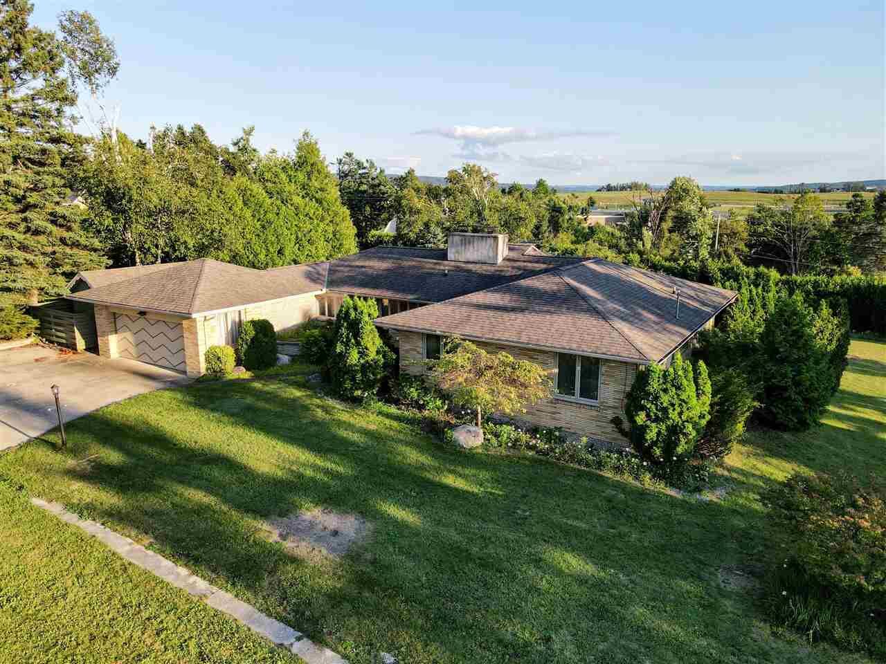 Property Photo:  250 Lincoln Place  MI 49770 