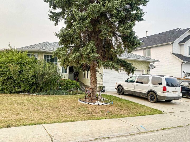 Property Photo:  5705 59 Avenue  AB T4H 1K3 