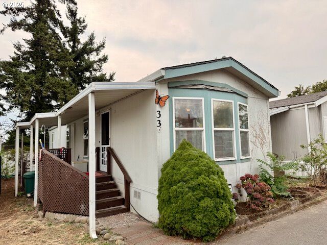 Property Photo:  7911 SE 82nd Ave 33  OR 97266 
