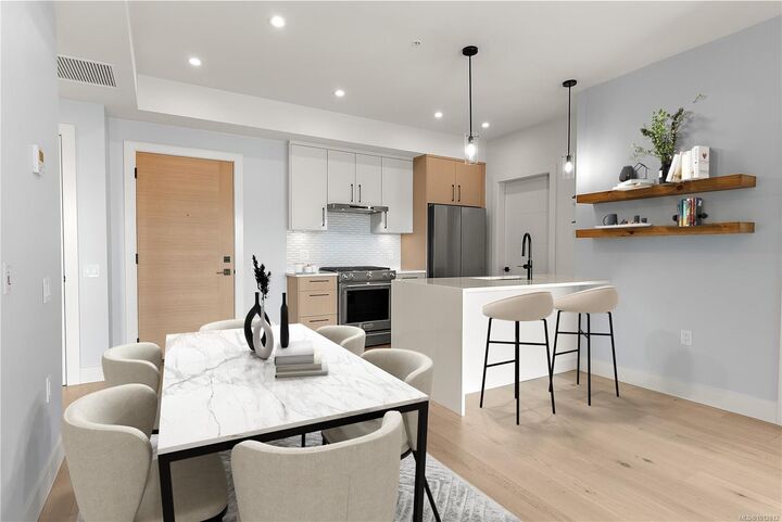 Property Photo:  9818 Fourth St 202  BC V8L 1X4 