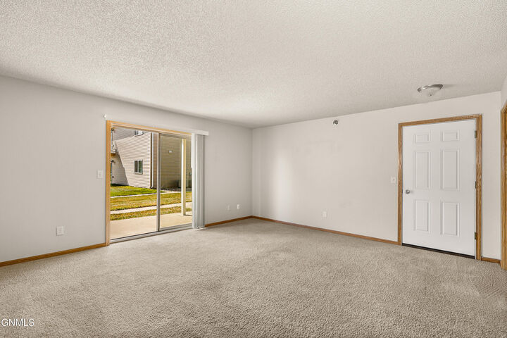 Property Photo: 4020 McKenzie Drive SE 2 ND 58554