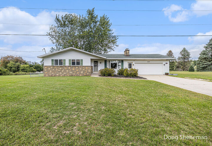 Property Photo:  4707 Cannonsburg Road NE  MI 49306 
