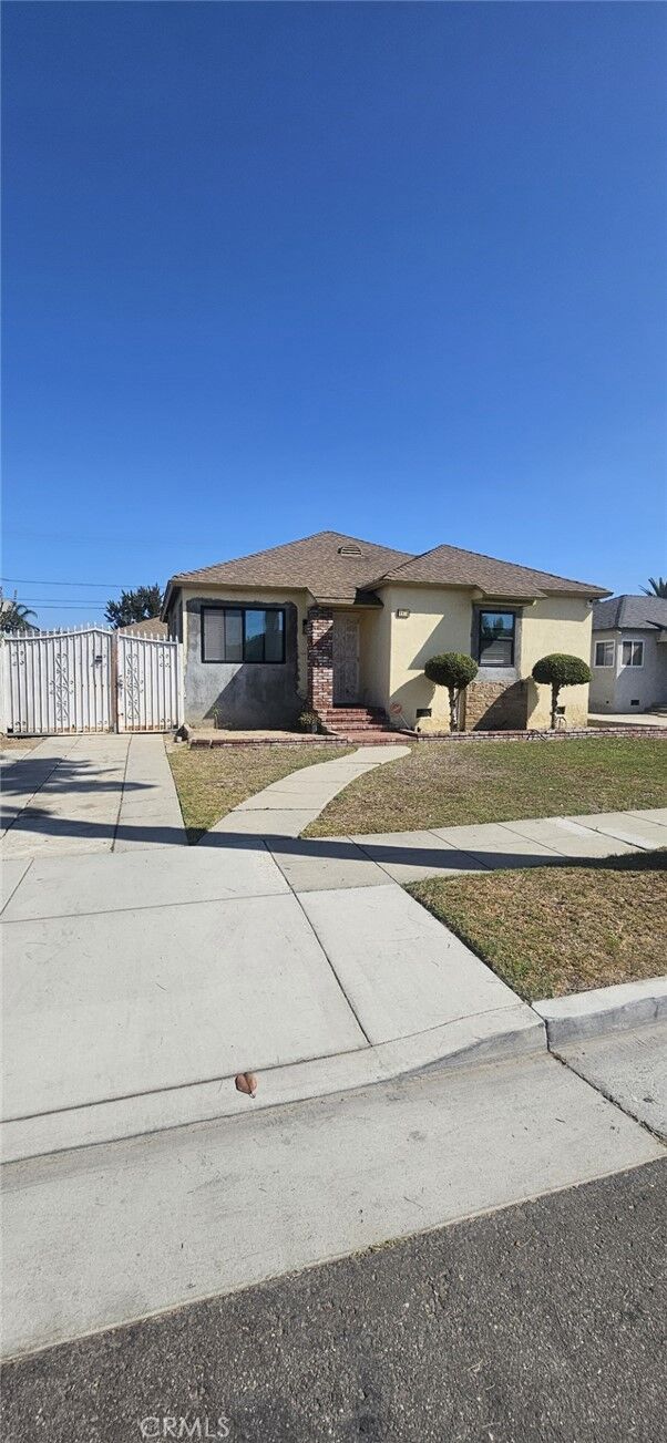 Property Photo:  1109 E 150th Street  CA 90220 