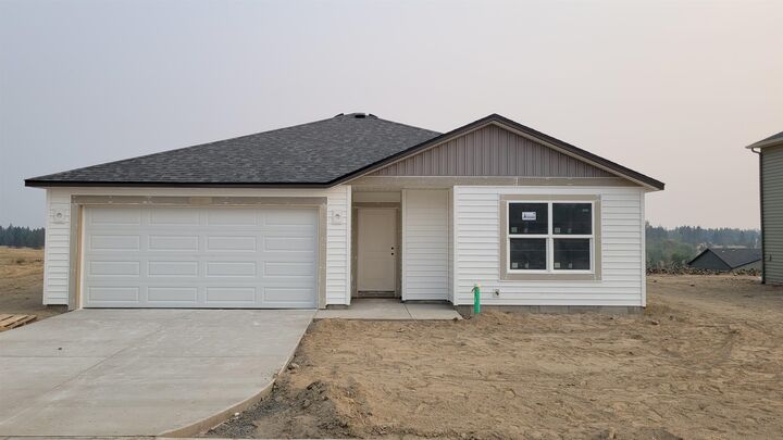 Property Photo:  818 E K St  WA 99006 