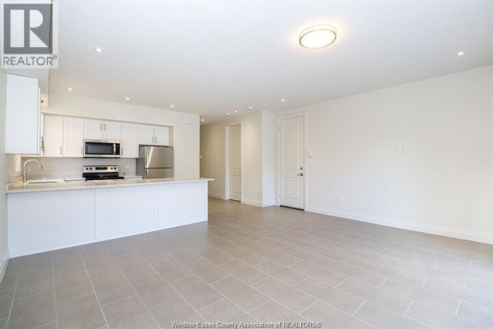 Property Photo: 233 Watson 206 ON N8S 3R8