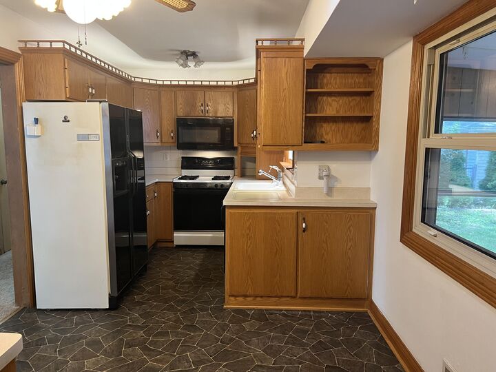 Property Photo:  1202 S 107th St  WI 53214 