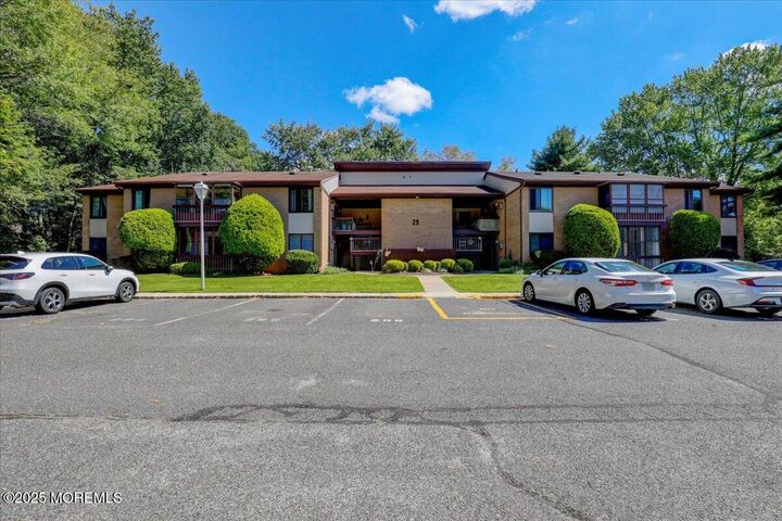 Property Photo:  29 Meadow Green Circle A  NJ 07726 