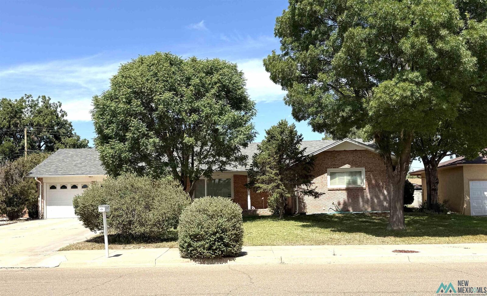 Property Photo:  1812 Briscoe Avenue  NM 88210 