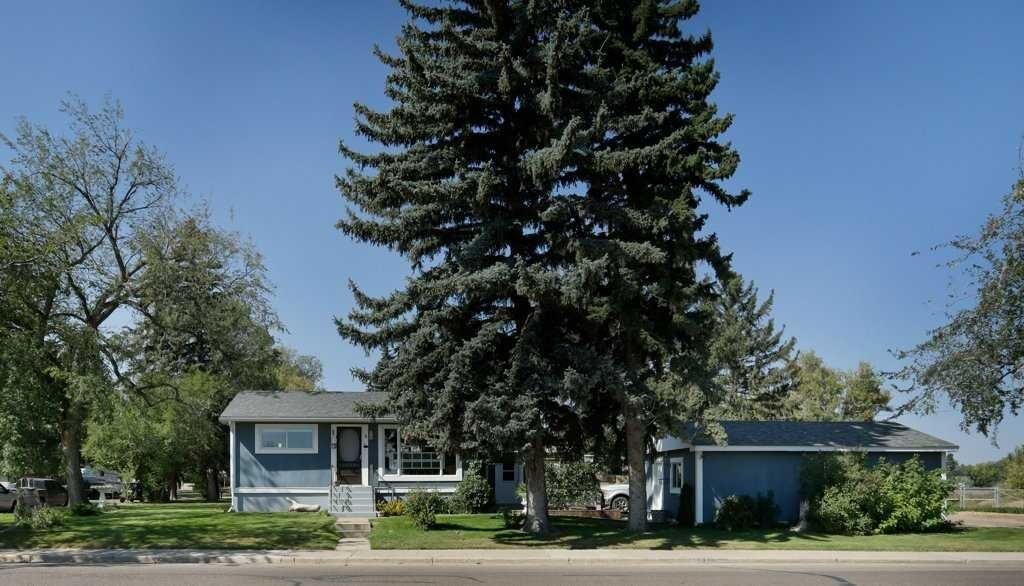 Property Photo:  4 Spruce Avenue W  AB T1R 1C5 