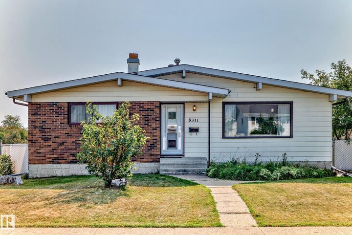 Property Photo:  8311 150 Avenue NW  AB T5E 1B9 