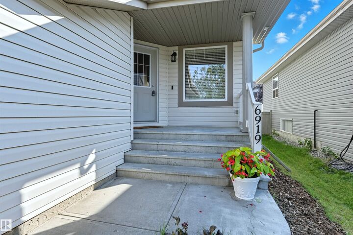 Property Photo:  6919 Strom Lane NW  AB T6R 0G3 