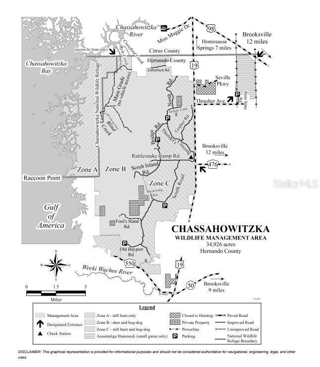 Property Photo:  Lot 9 Commercial Way  FL 34614 
