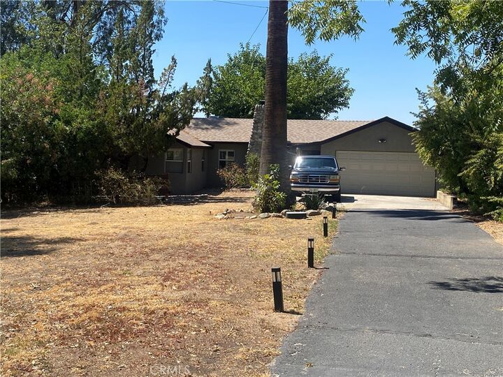 Property Photo:  11748 Douglas  CA 92399 
