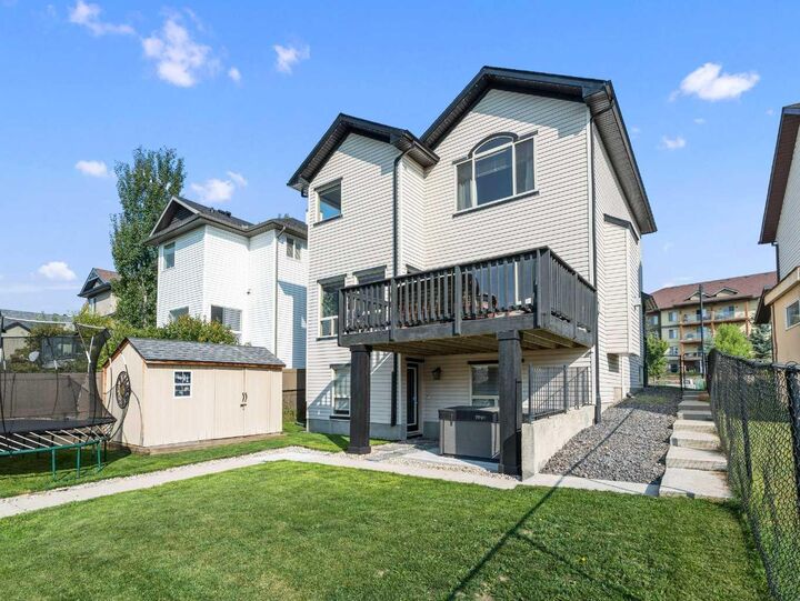 Property Photo:  95 Crystal Shores Road  AB T1S 2H9 