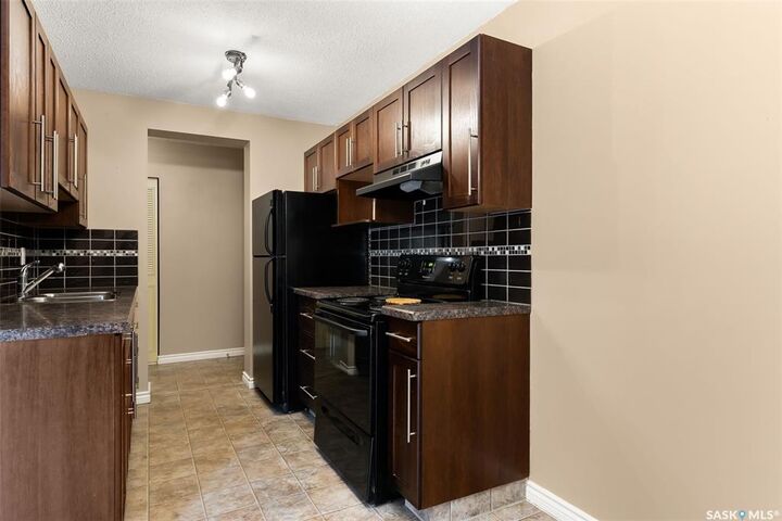 Property Photo:  1953 Garnet Street 6  SK S4T 2Z5 