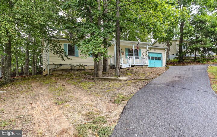 Property Photo:  6317 Plantation Forest Drive  VA 22553 