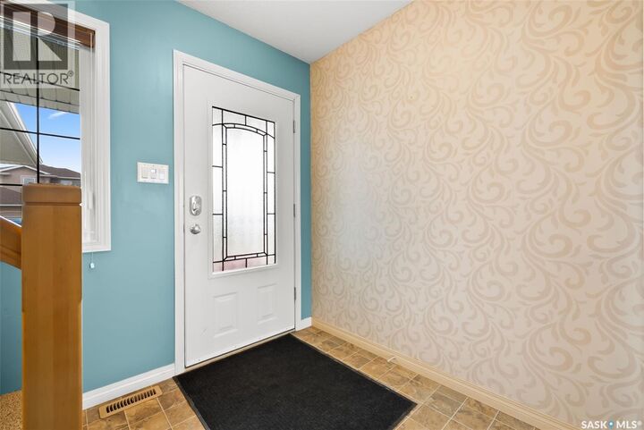 Property Photo:  8238 Fairways West Drive  SK S4Y 0A1 