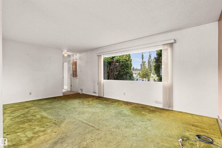 Property Photo:  7131 83 Street NW  AB T6C 2Y1 