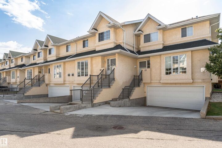 Property Photo:  2419 133 Avenue NW 22  AB T5A 5A5 