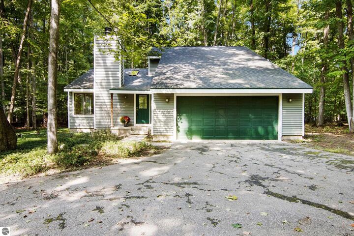 Property Photo:  2345 Kenona Woods Drive  MI 49696 