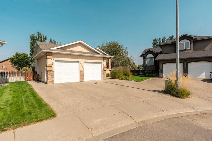 Property Photo:  4513 51 Avenue  AB T1G 1H6 