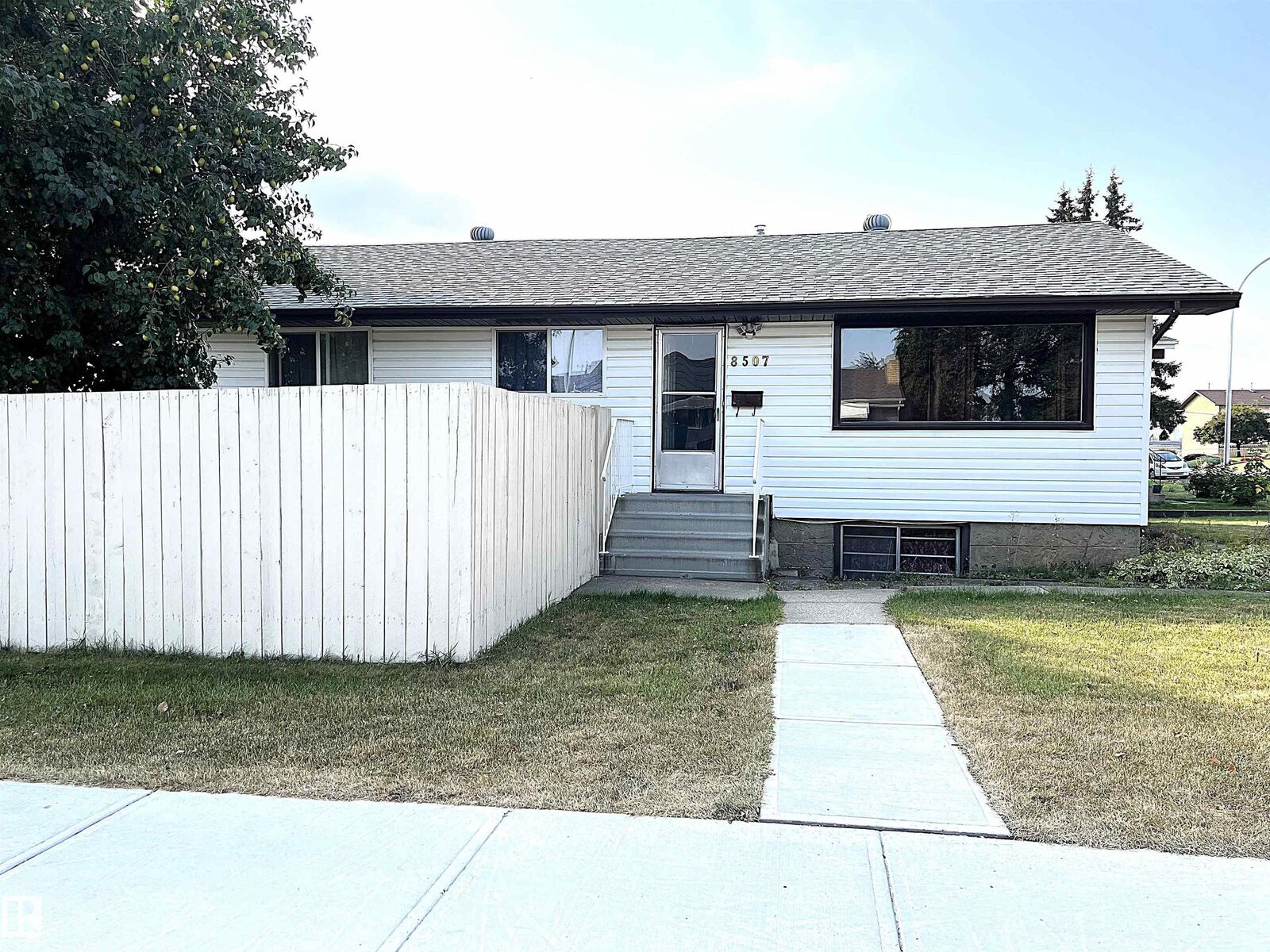 Property Photo:  8507 8509 128 Avenue NW  AB T5E 0E9 